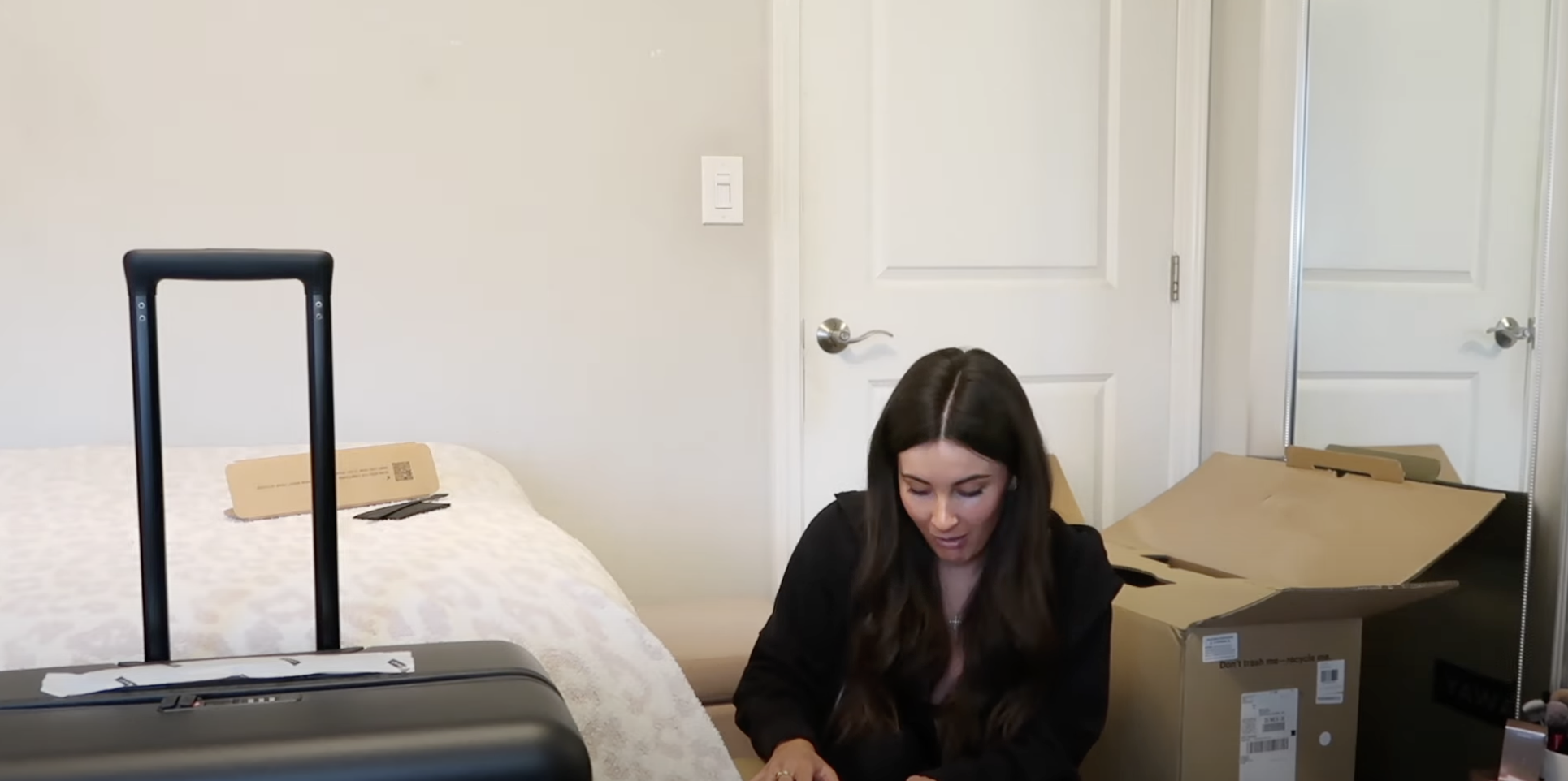 woman unboxing away travel ...