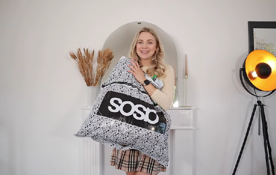 Girl with a bag from the ASOS store
